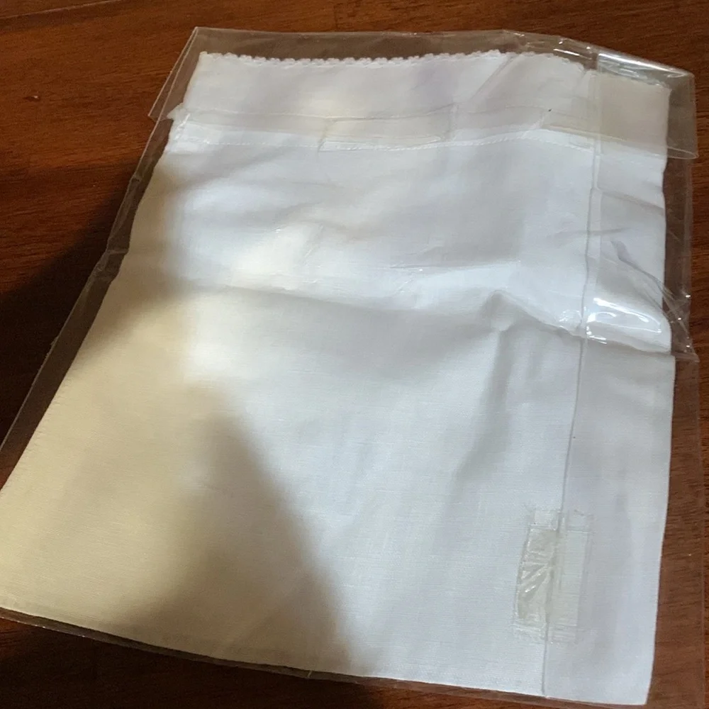 And beautiful hand made rare linen pouch with letter N hand dawn. Brand new!